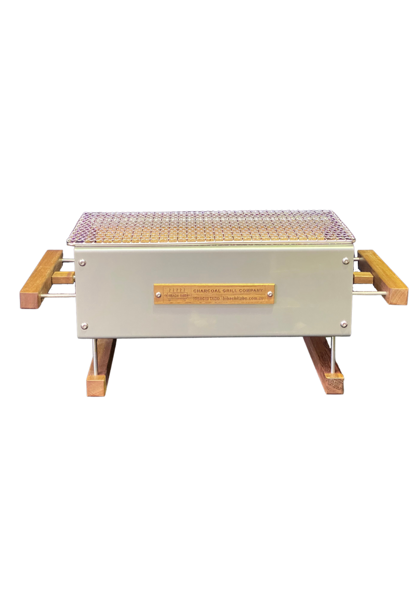 Hibachi Tabo Hibachi Grill" The Que Club